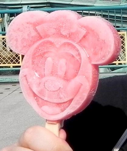 A peach and raspberry Minnie ice pop