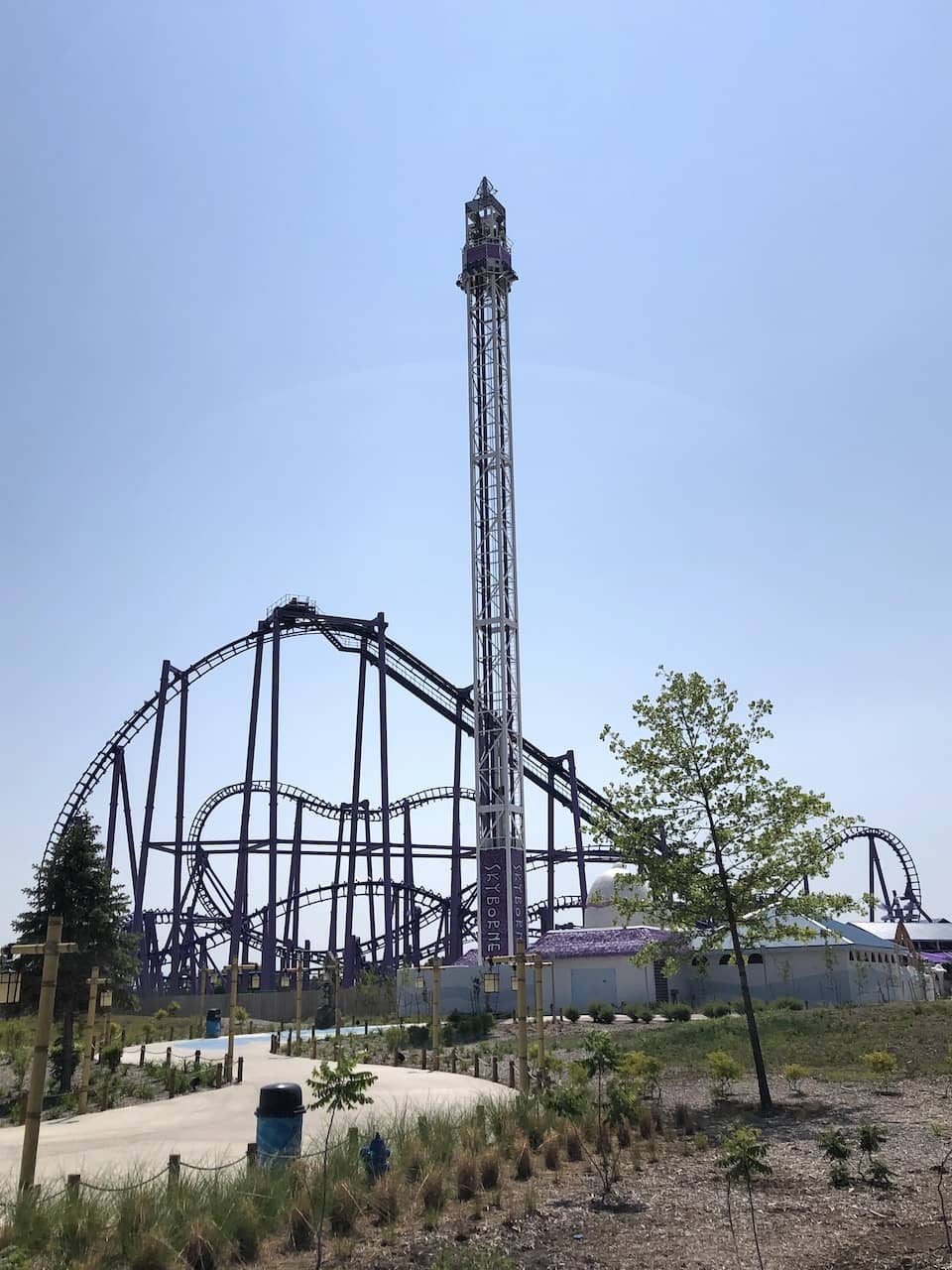 A roller coaster in a park